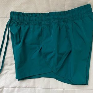 Teal running shorts - medium